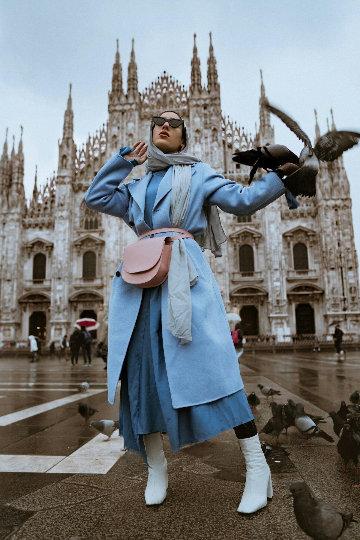 A model wearing the Manteau de Nuit charcoal wool coat